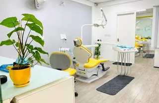 Dental crown smile design before and after at DENTIN Dental Clinic, HSR Layout