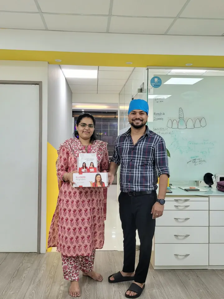 Clear aligner patient with her dentist at DENTIN