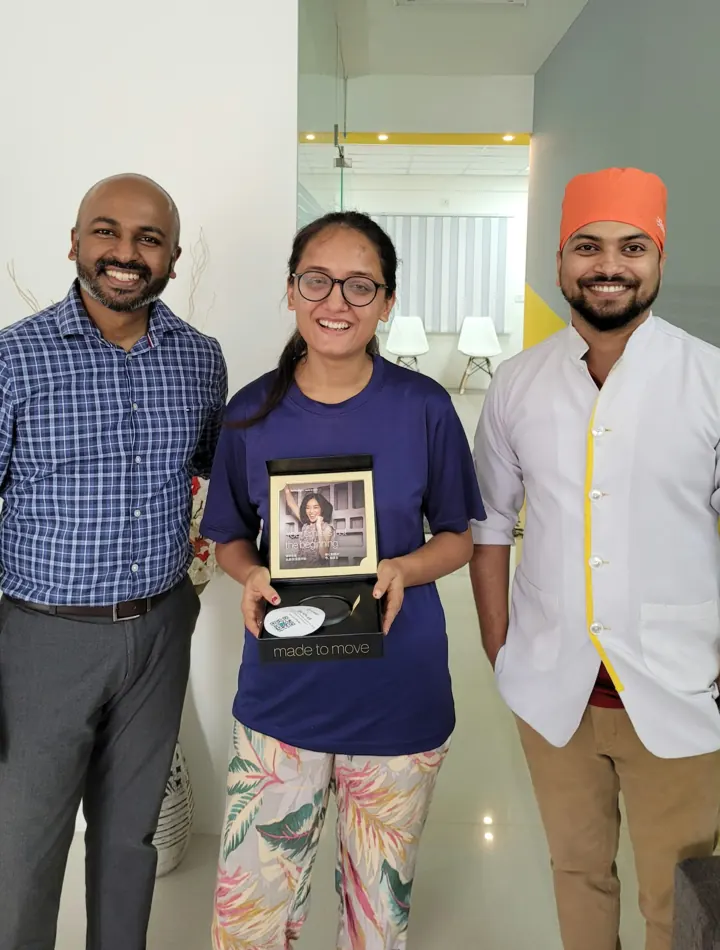 Invisalign patient with Dr. Prahlad Shenava and Dr. Kumar Gaurav at DENTIN