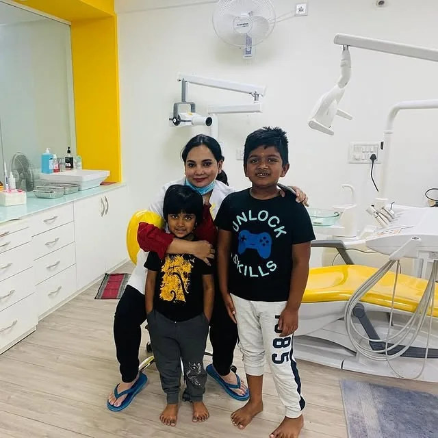 Pediatric dentist with children at DENTIN, HSR Layout Bengaluru