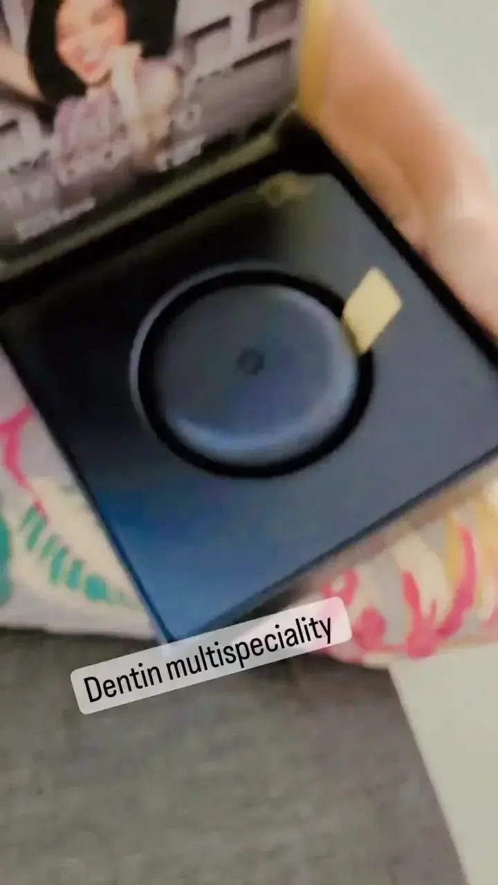 Patient unboxes Invisalign clear aligners from DENTIN